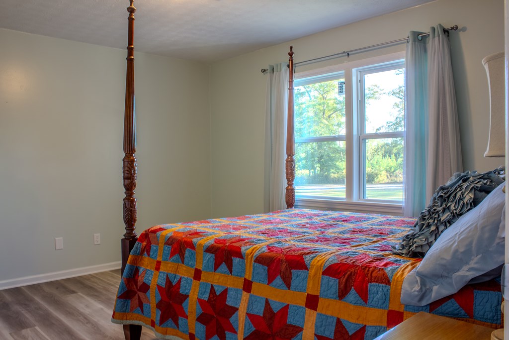 196 Russell Williams Road Eufaula, AL 36027 - Photo 10 of 30 a bedroom with a bed and a window