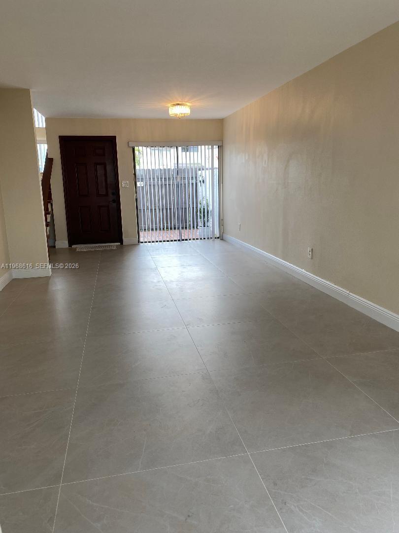 11339 Southwest 71st Lane Miami, FL 33173 - Photo 2 of 19 a view of an empty room with a window