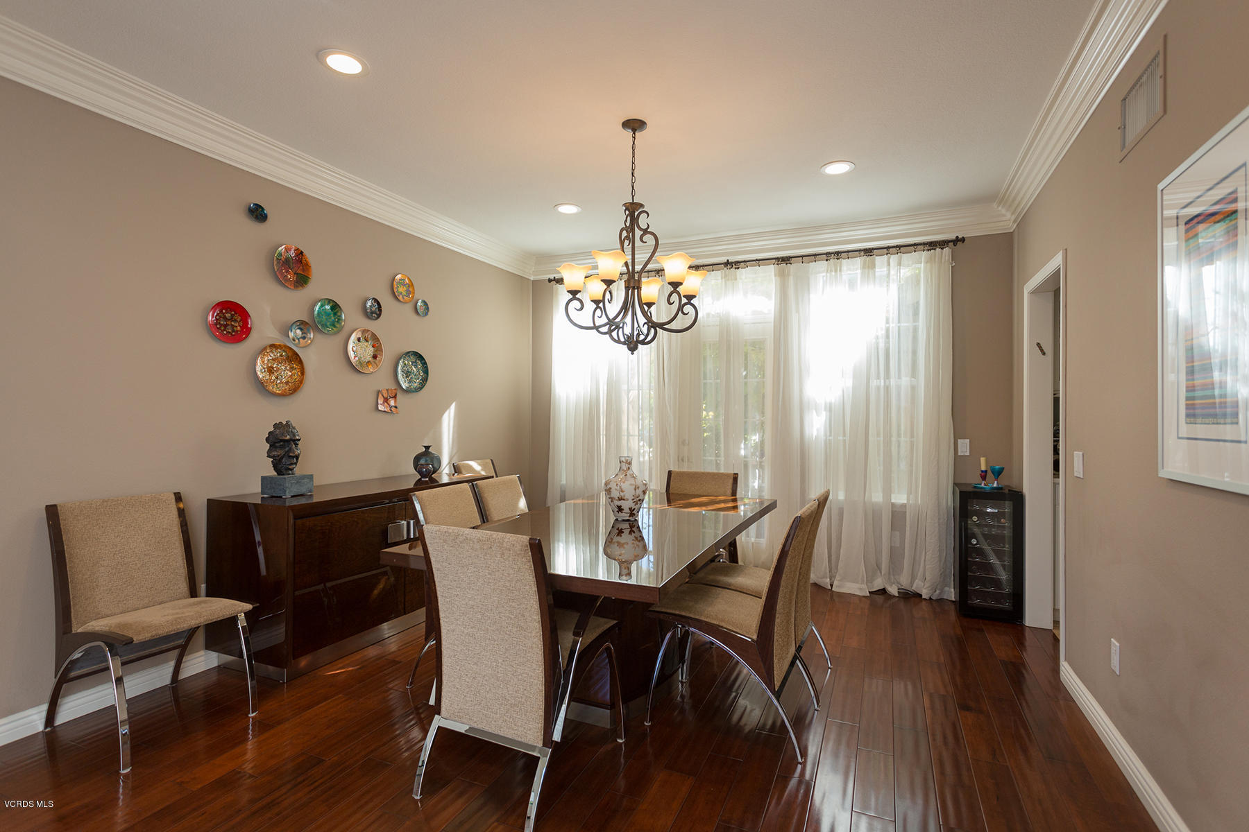 558 Rustic Hills Drive Simi Valley, CA 93065 - Photo 12 of 50 a view of a dining room with furniture window and wooden floor