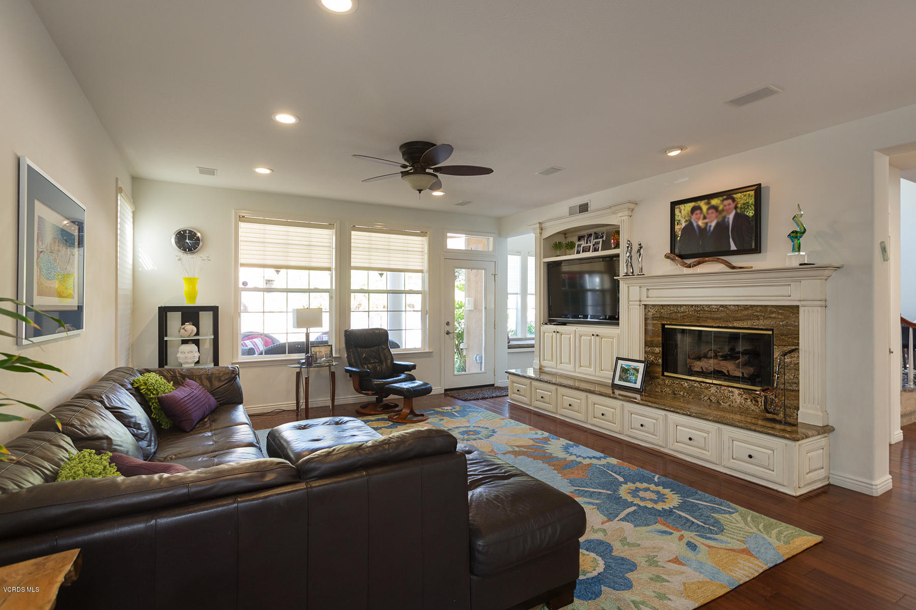 558 Rustic Hills Drive Simi Valley, CA 93065 - Photo 13 of 50 a living room with furniture fireplace and window