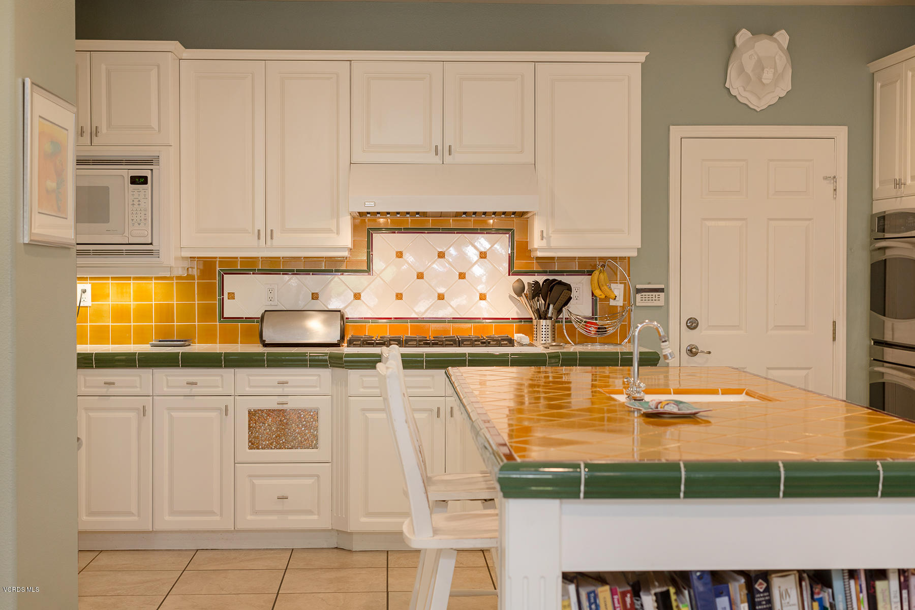 558 Rustic Hills Drive Simi Valley, CA 93065 - Photo 18 of 50 a kitchen with stainless steel appliances granite countertop a sink and cabinets