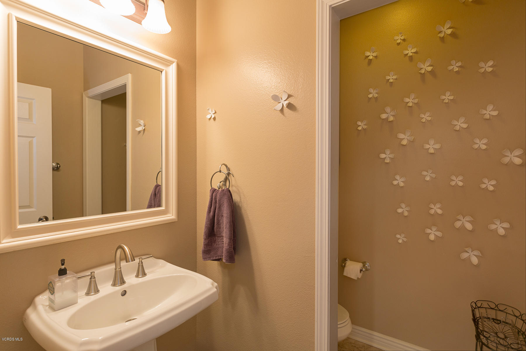 558 Rustic Hills Drive Simi Valley, CA 93065 - Photo 21 of 50 a bathroom with a sink and a mirror