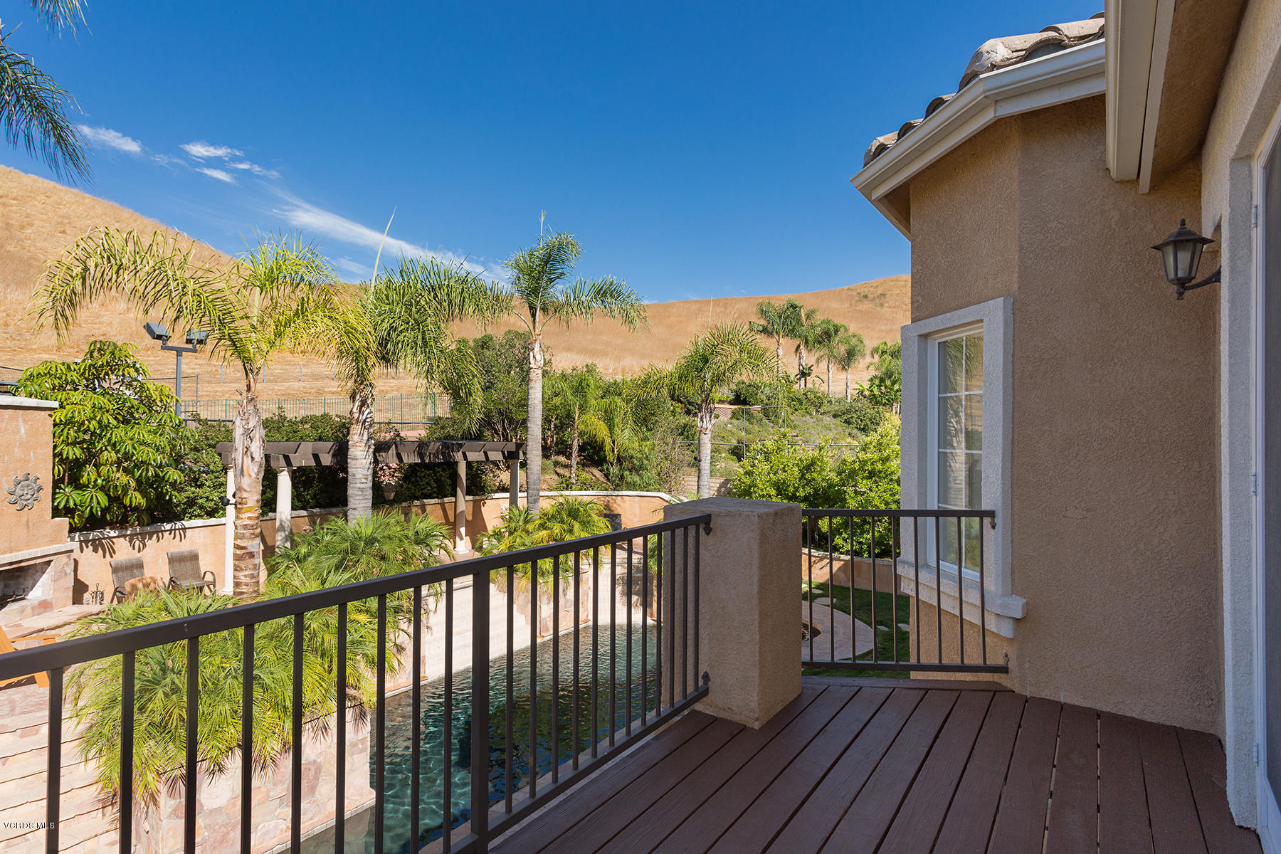 558 Rustic Hills Drive Simi Valley, CA 93065 - Photo 27 of 50 a view of a balcony with wooden floor