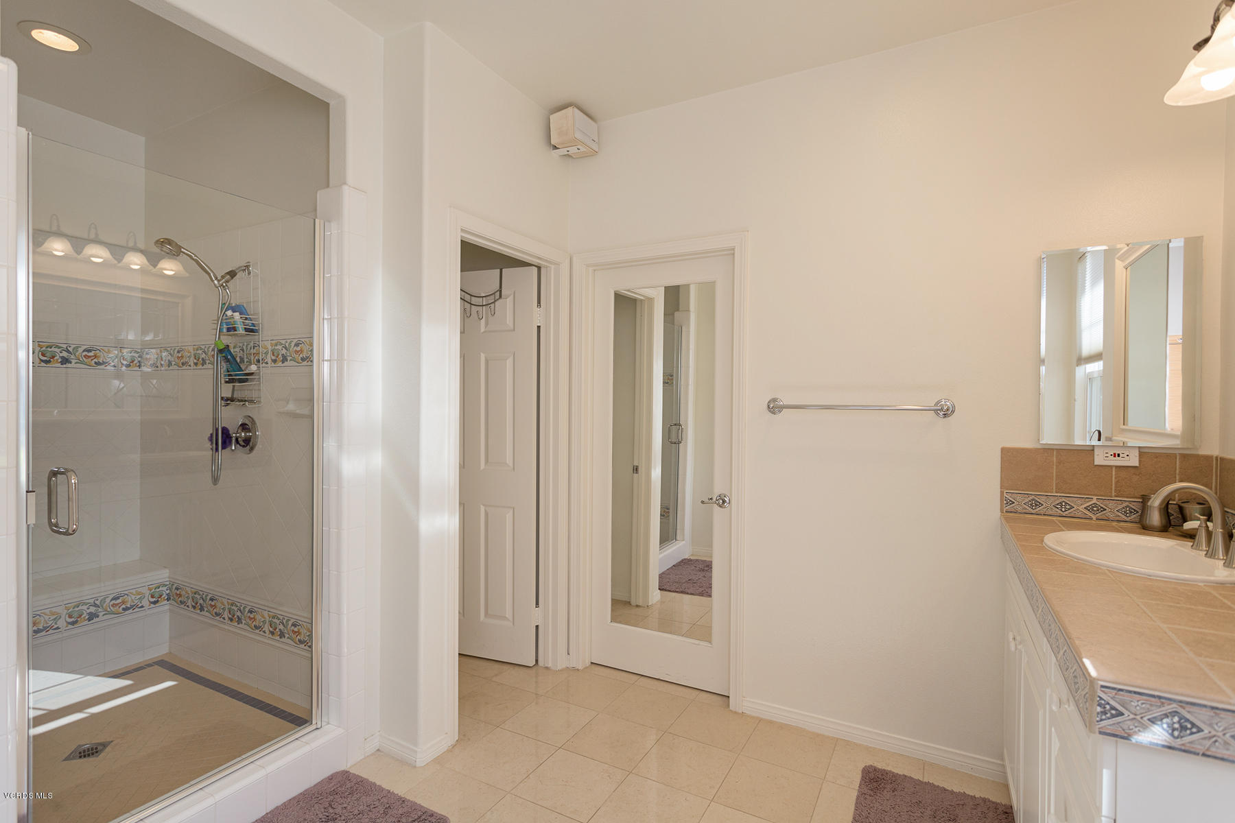 558 Rustic Hills Drive Simi Valley, CA 93065 - Photo 30 of 50 a bathroom with a sink and shower