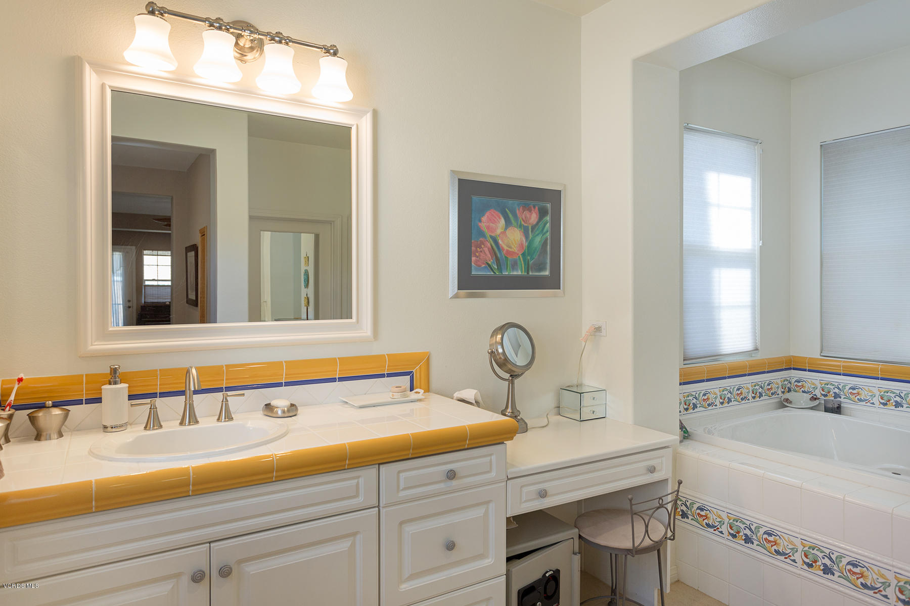 558 Rustic Hills Drive Simi Valley, CA 93065 - Photo 31 of 50 a bathroom with a tub and a sink