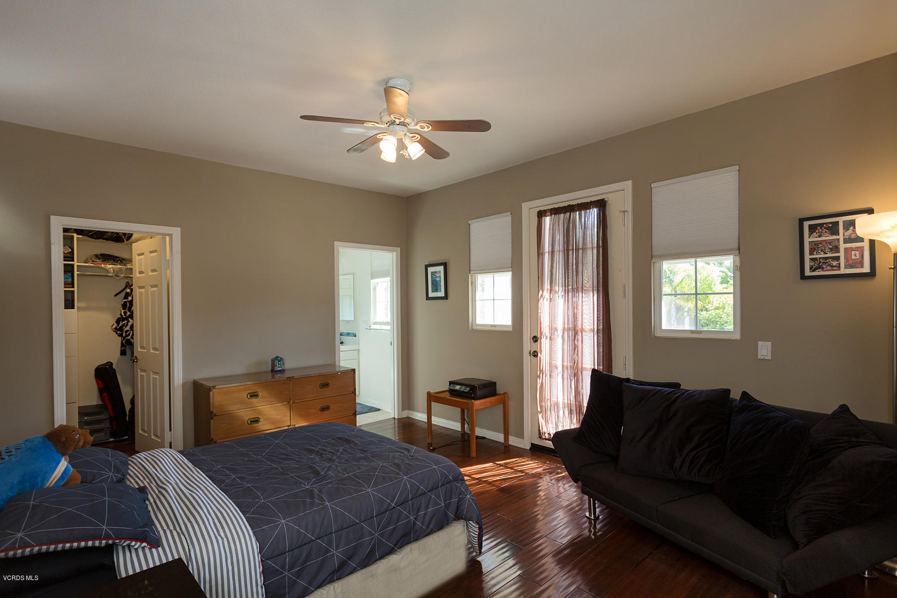 558 Rustic Hills Drive Simi Valley, CA 93065 - Photo 33 of 50 a bedroom with a bed couch and a window