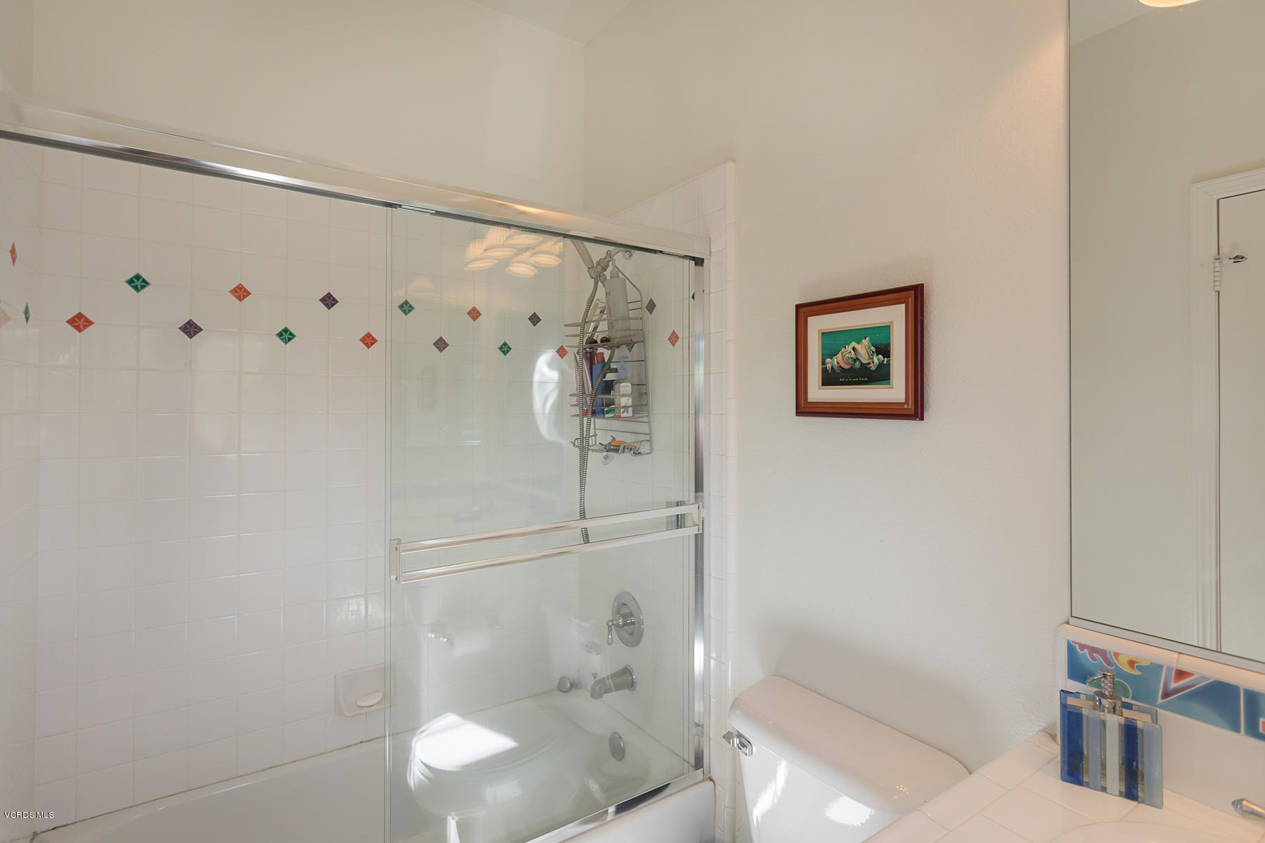 558 Rustic Hills Drive Simi Valley, CA 93065 - Photo 35 of 50 a bathroom with a shower and toilet