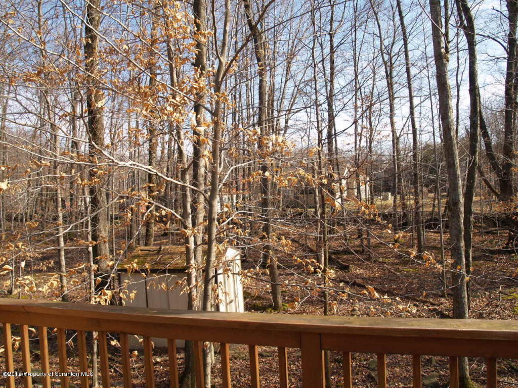 3250 Northgate Road Lake Ariel, PA 18436 - Photo 3 of 20 a view of a wooden fence and trees