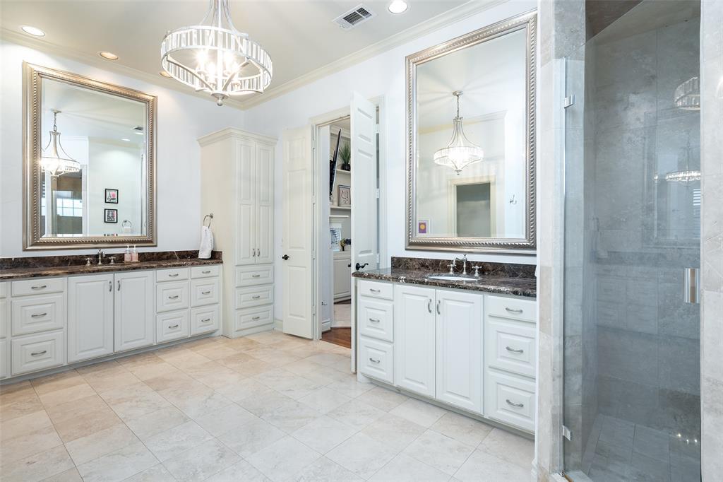 4422 Pomona Road Dallas, TX 75209 - Photo 18 of 34 a large bathroom with a granite countertop double vanity sink a mirror and a bathtub