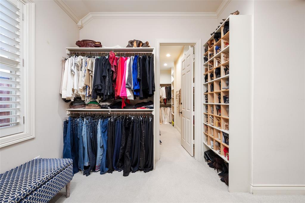 4422 Pomona Road Dallas, TX 75209 - Photo 20 of 34 a view of a bedroom with clothes and shoes