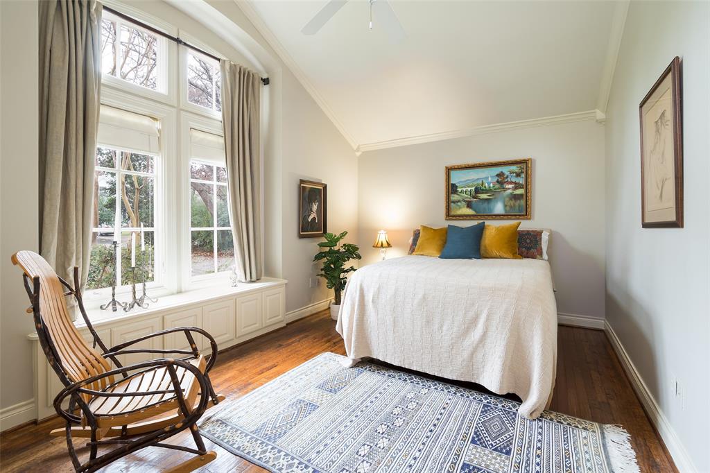 4422 Pomona Road Dallas, TX 75209 - Photo 22 of 34 a bedroom with a large bed and a window