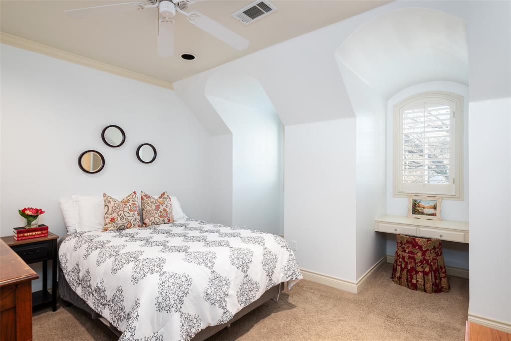 4422 Pomona Road Dallas, TX 75209 - Photo 24 of 34 a bedroom with a bed and a window