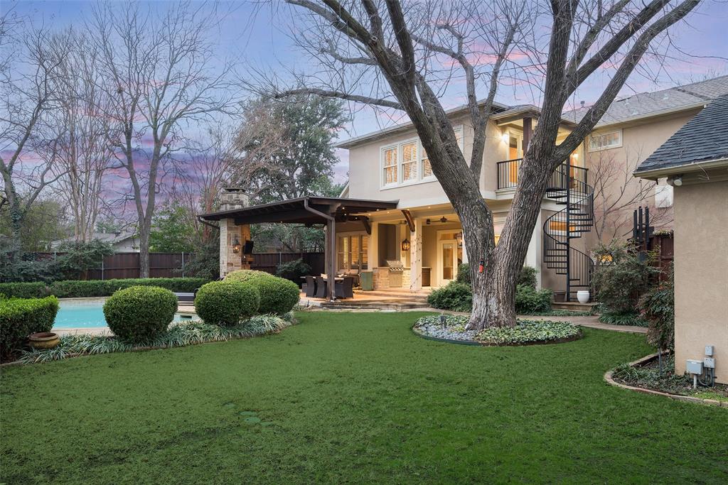 4422 Pomona Road Dallas, TX 75209 - Photo 29 of 34 a front view of a house with garden