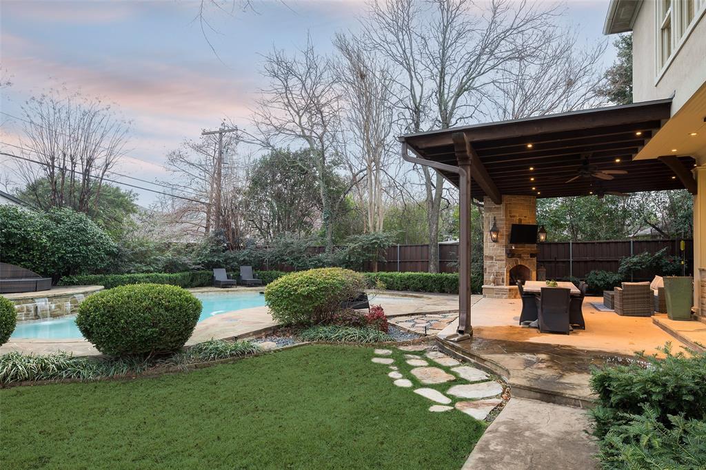 4422 Pomona Road Dallas, TX 75209 - Photo 31 of 34 a view of a backyard with sitting area and garden