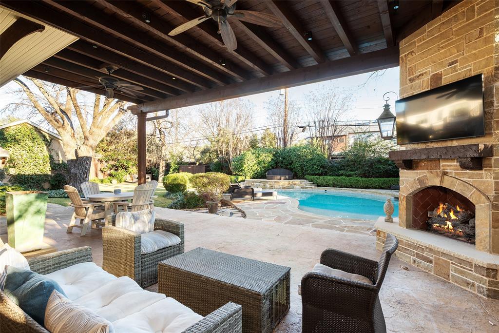 4422 Pomona Road Dallas, TX 75209 - Photo 32 of 34 a view of a patio with couches and a fireplace