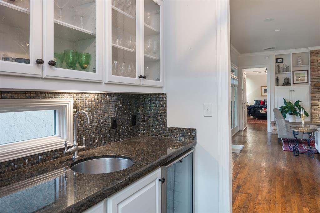 4422 Pomona Road Dallas, TX 75209 - Photo 8 of 34 a kitchen with granite countertop a sink and a stove