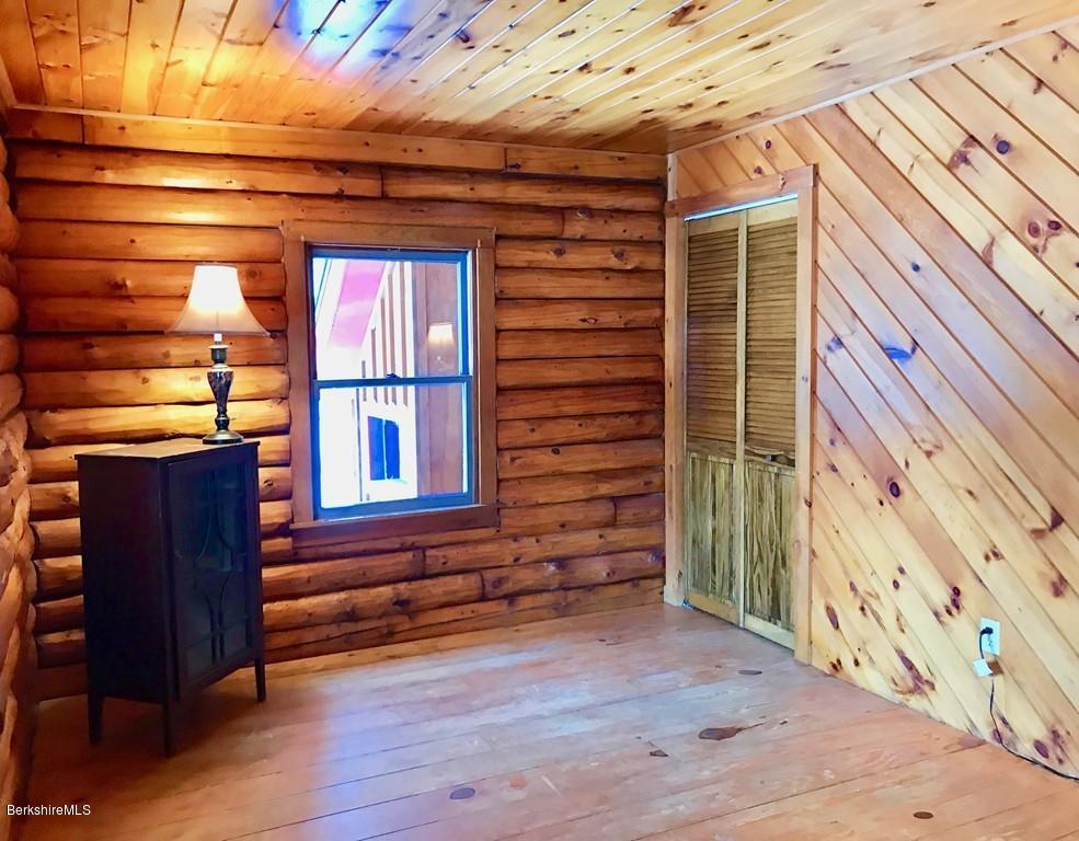 675 Patten Road Shelburne, MA 01370 - Photo 14 of 28 a view of front door of house with wooden floor