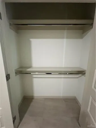 a view of a room with racks on the wall