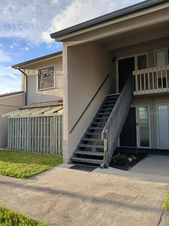 front view of a house with a deck