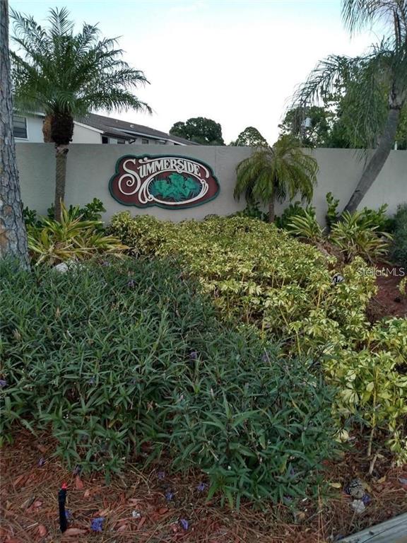 5787 Summerside Lane, Unit 4B Sarasota, FL 34231 - Photo 2 of 21 a view of outdoor space and outdoor seating