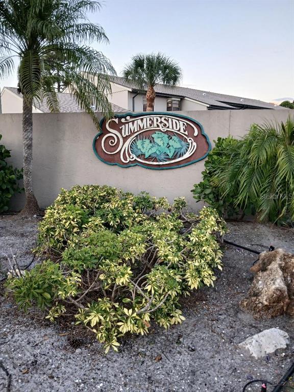 5787 Summerside Lane, Unit 4B Sarasota, FL 34231 - Photo 21 of 21 a view of a bunch of plants and tree