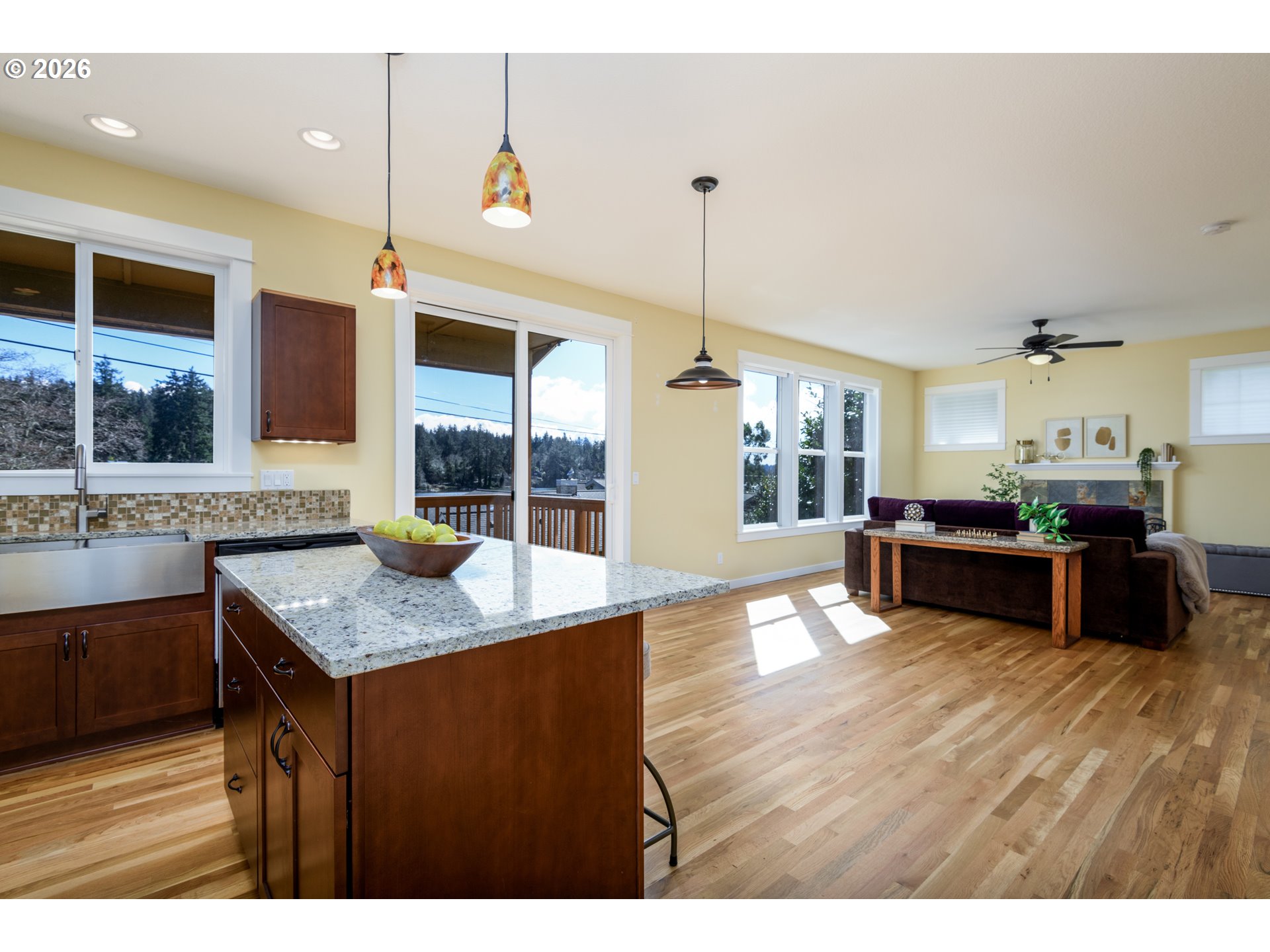 5300 Northeast 49th Street Neotsu, OR 97364 - Photo 20 of 48 a kitchen with stainless steel appliances granite countertop a sink a oven and a counter top space