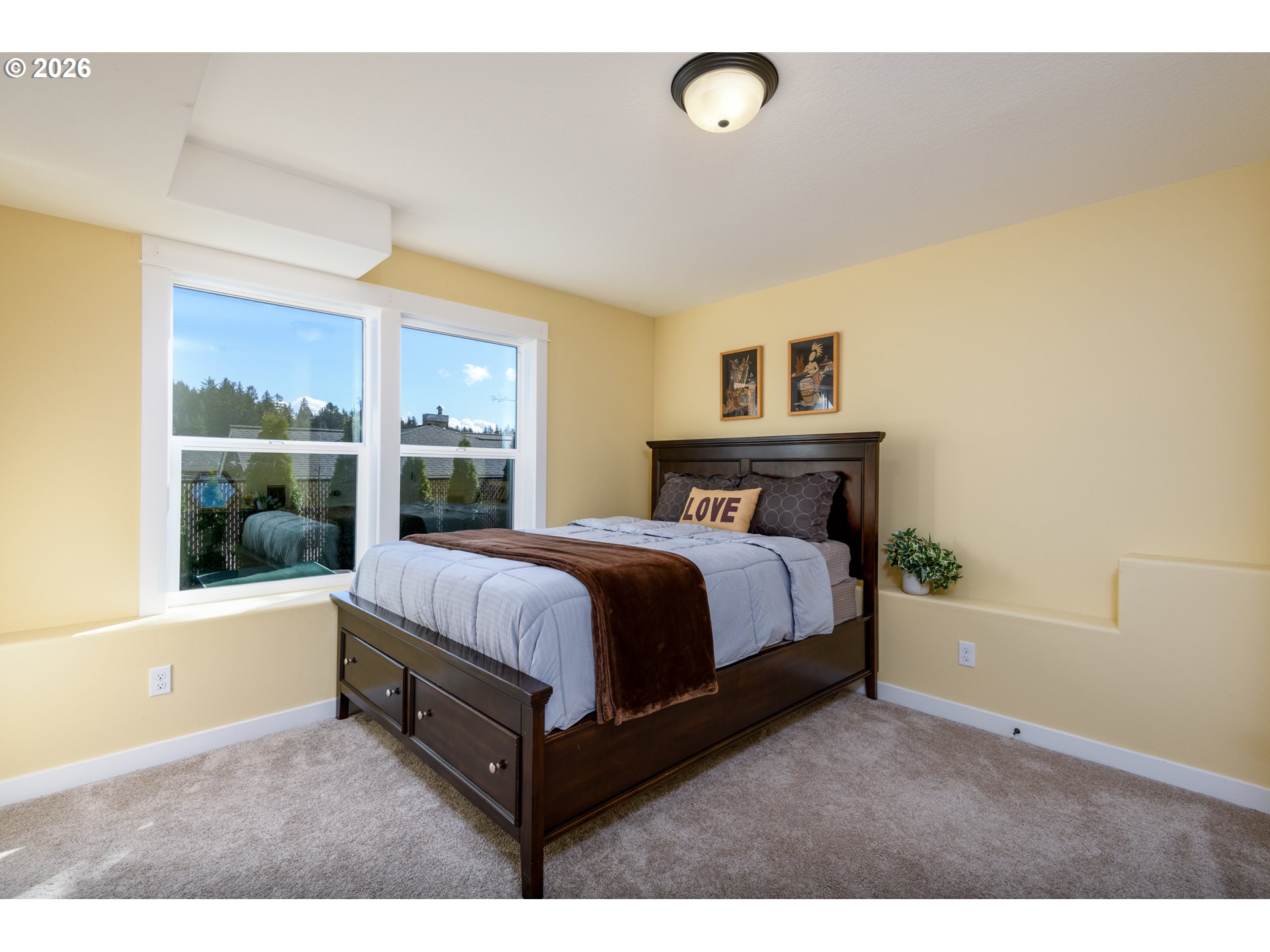 5300 Northeast 49th Street Neotsu, OR 97364 - Photo 34 of 48 a spacious bedroom with a bed and window