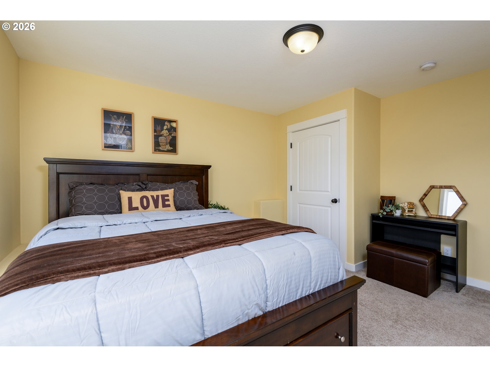 5300 Northeast 49th Street Neotsu, OR 97364 - Photo 35 of 48 a bedroom with a bed and lamps