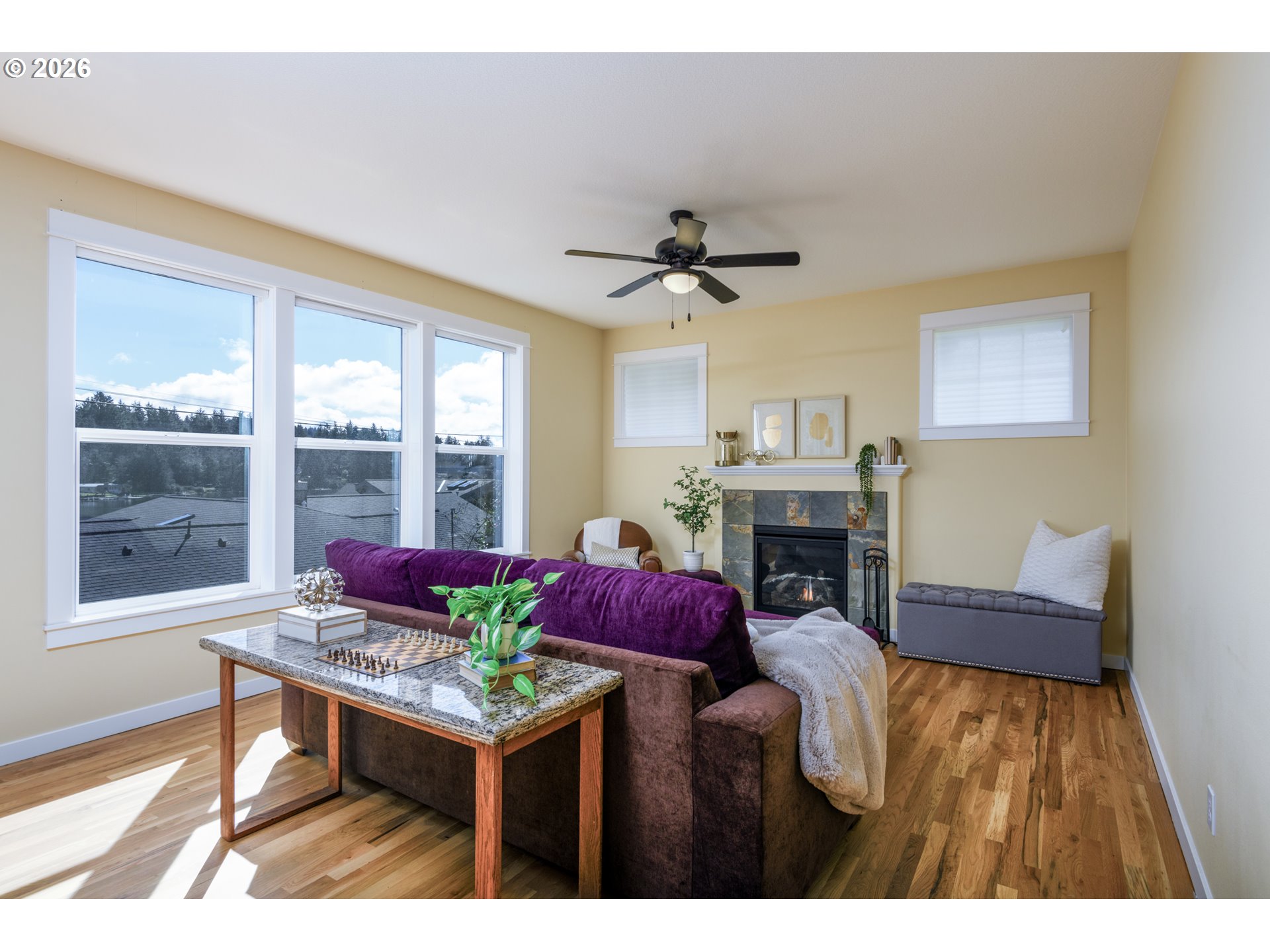 5300 Northeast 49th Street Neotsu, OR 97364 - Photo 7 of 48 a living room with furniture fireplace and window
