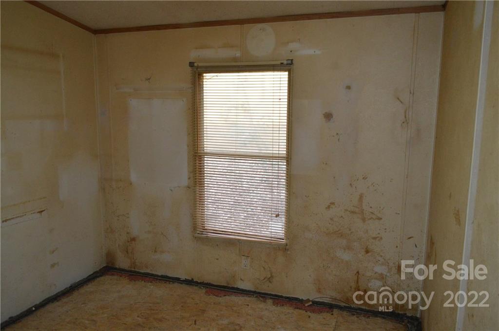 522 Gilreath Loop Road Mills River, NC 28759 - Photo 11 of 15 a bathroom that has a window in it