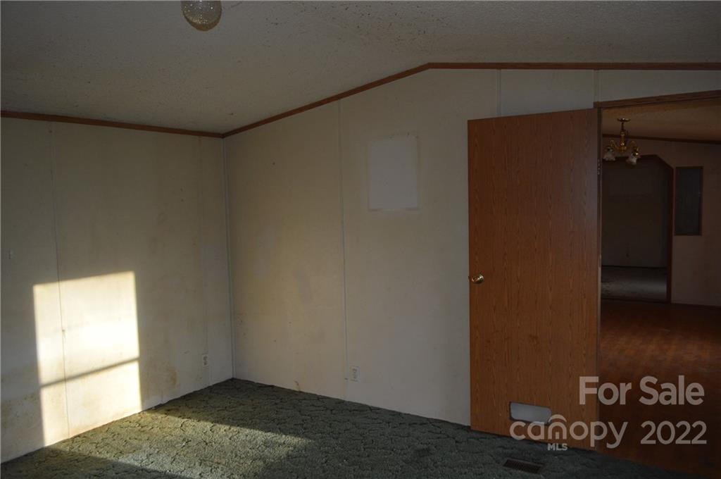 522 Gilreath Loop Road Mills River, NC 28759 - Photo 6 of 15 a view of an empty room and a window