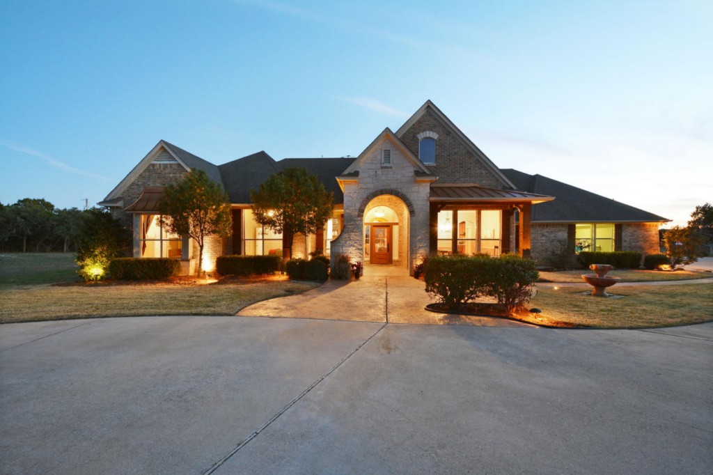 11801 Rim Rock Trail Austin, TX 78737 - Photo 1 of 1 a front view of a house with a yard