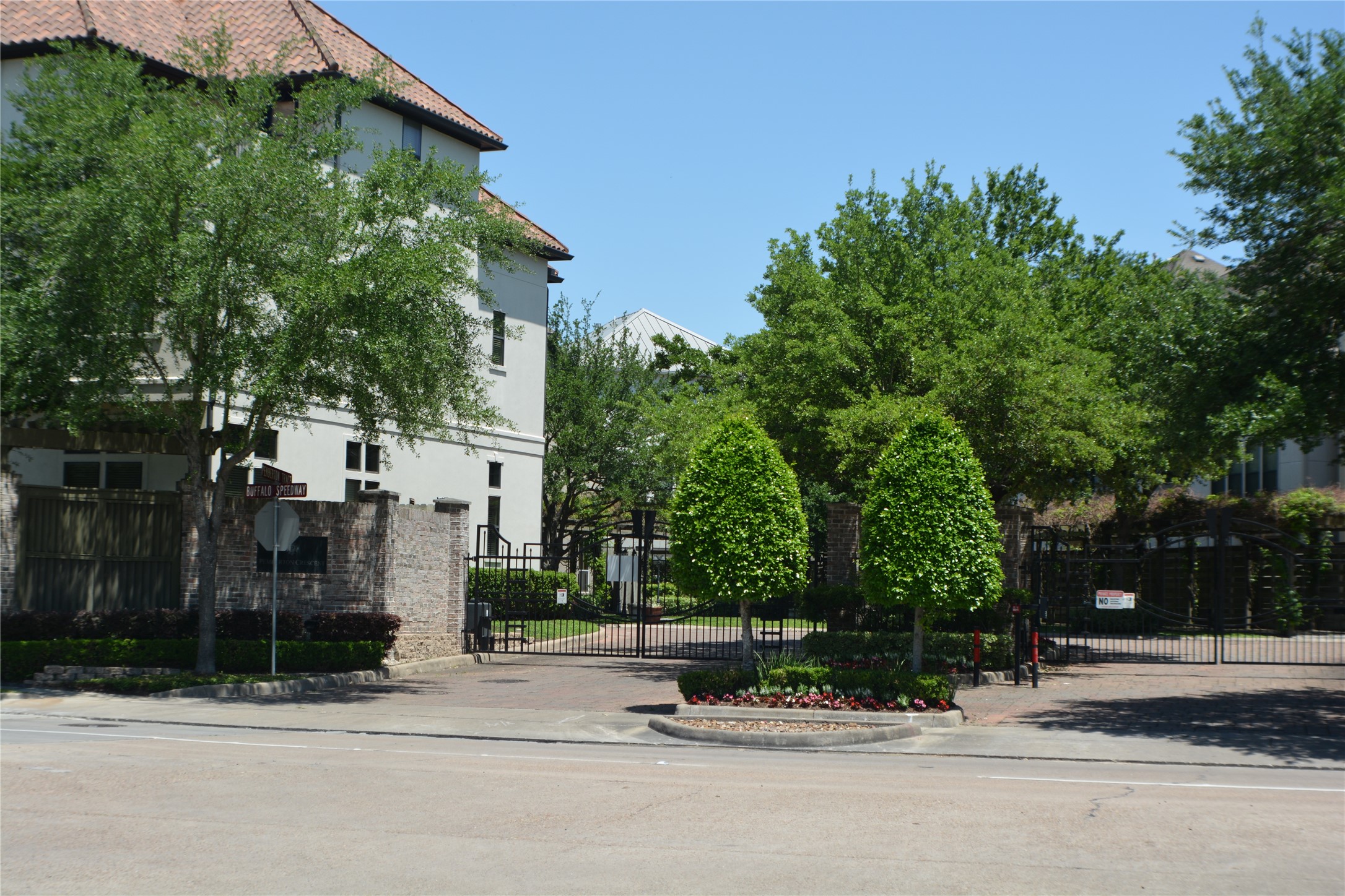 front view of a house with a garden
