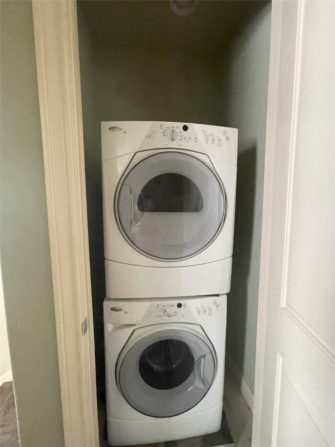 3138 Pemberton Walk Houston, TX 77025 - Photo 26 of 27 a utility room with dryer and washer