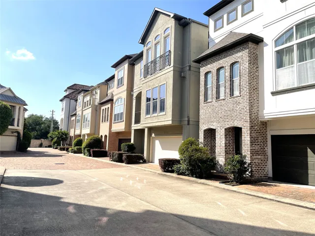 a view of a building with a street