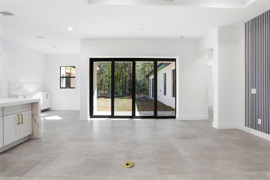 16728 Bearle Road Orlando, FL 32828 - Photo 21 of 72 a view of an empty room with a window