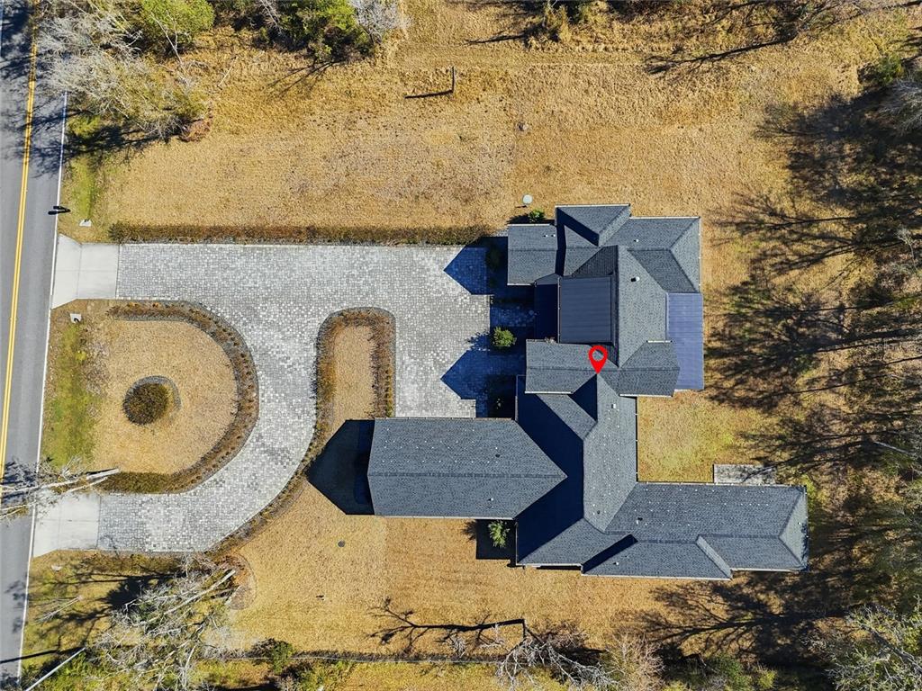 16728 Bearle Road Orlando, FL 32828 - Photo 57 of 72 a aerial view of a house with a yard