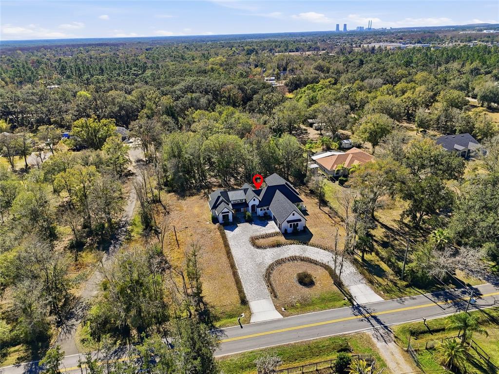 16728 Bearle Road Orlando, FL 32828 - Photo 59 of 72 an aerial view of a house with a yard