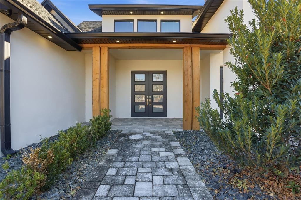 16728 Bearle Road Orlando, FL 32828 - Photo 6 of 72 a view of a door of the house