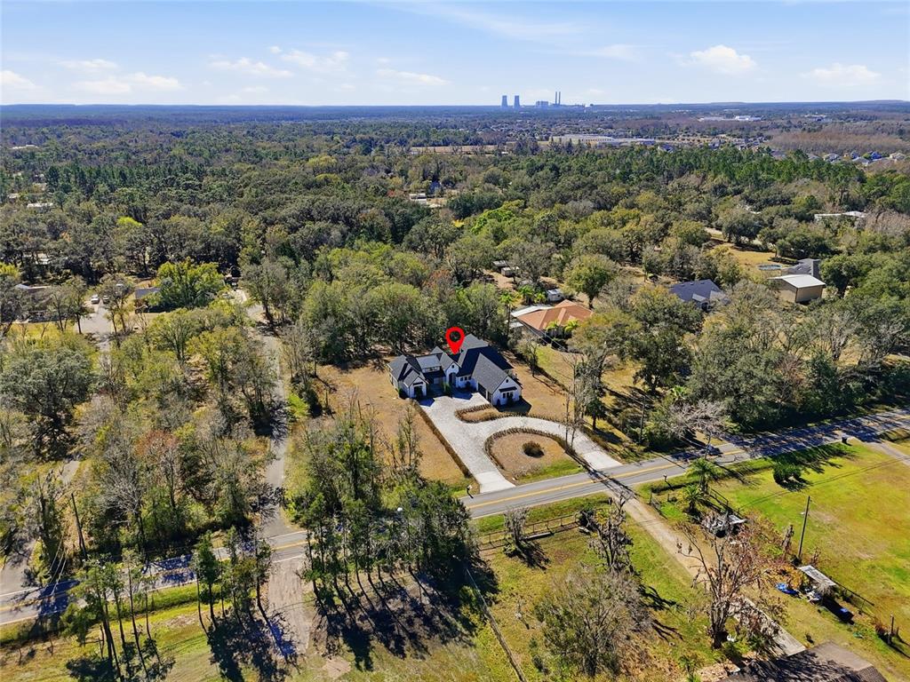 16728 Bearle Road Orlando, FL 32828 - Photo 63 of 72 an aerial view of residential houses with outdoor space