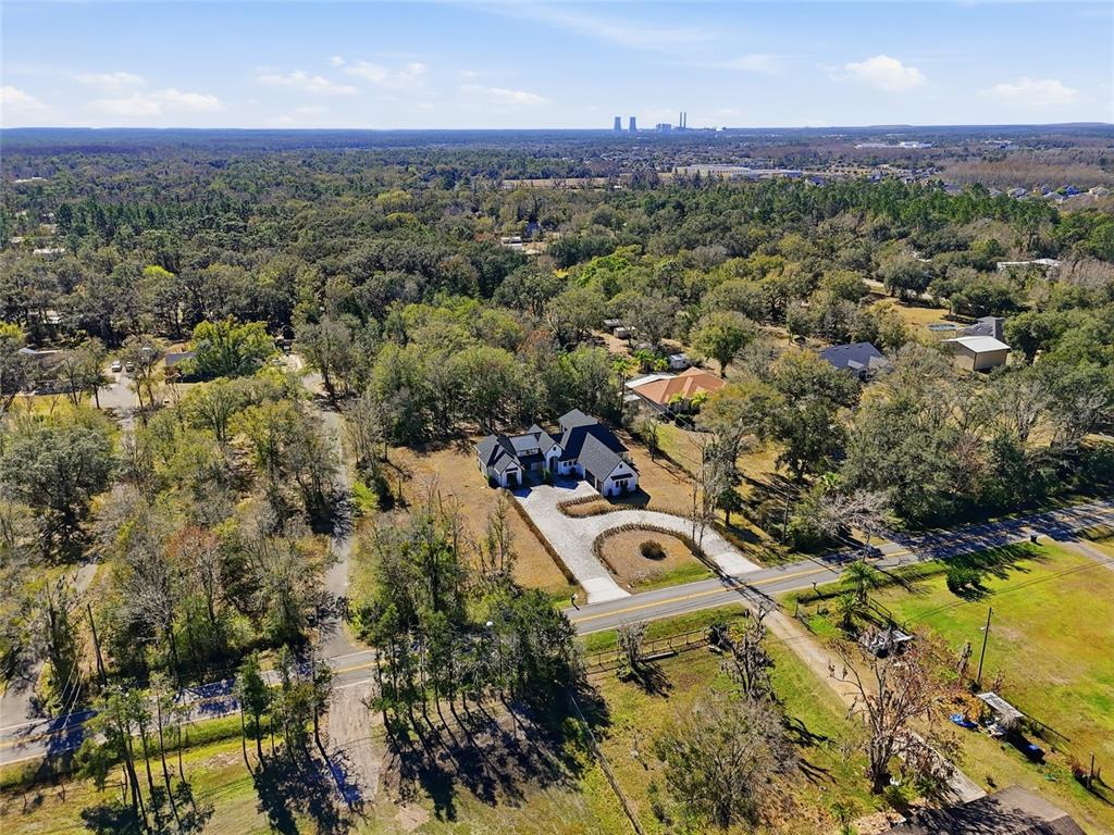 16728 Bearle Road Orlando, FL 32828 - Photo 64 of 72 an aerial view of residential houses with outdoor space