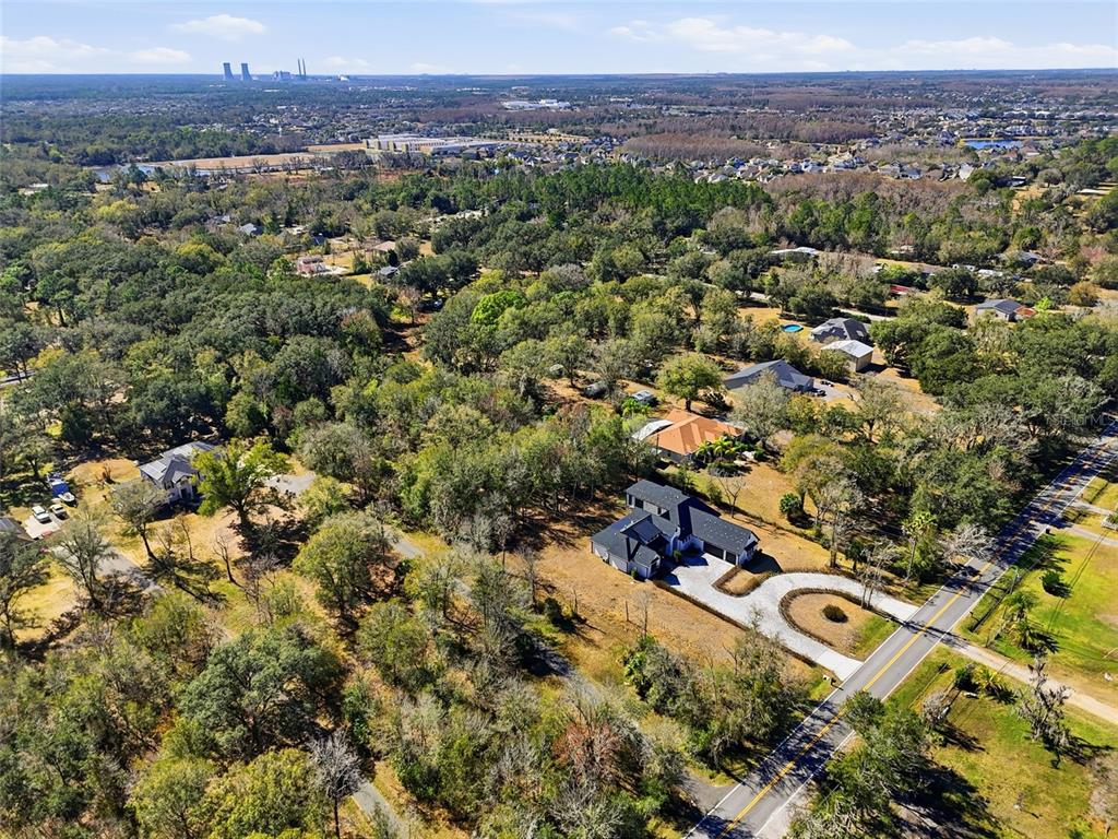 16728 Bearle Road Orlando, FL 32828 - Photo 67 of 72 an aerial view of a city with lots of residential buildings