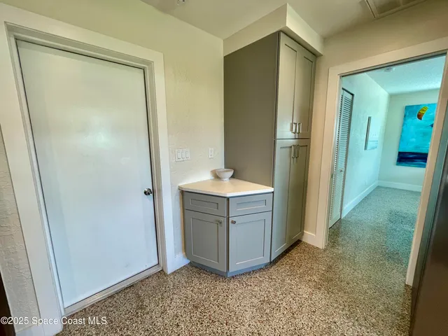 a room with storage and utility