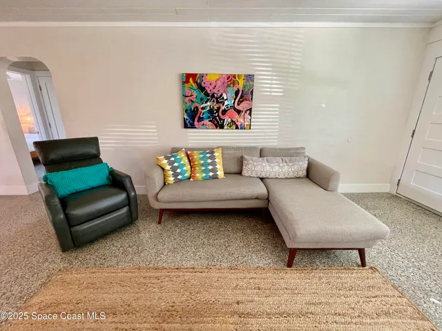 a bedroom with furniture and a couch