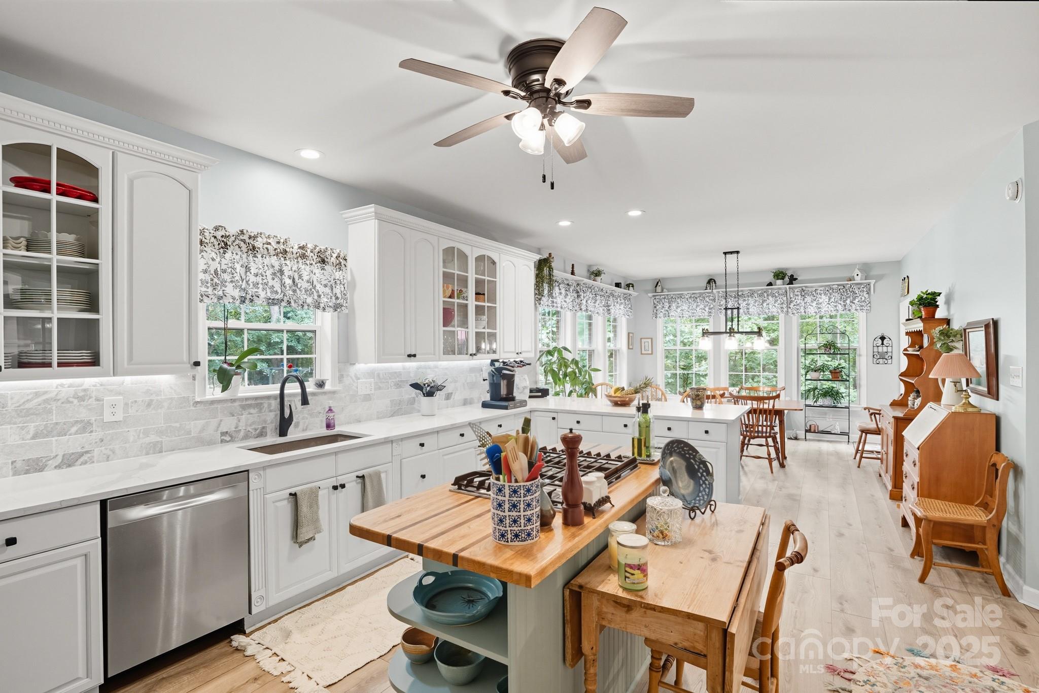 316 Brigadier Drive Clover, SC 29710 - Photo 12 of 47 a view of a dining room and livingroom with furniture window and wooden floor