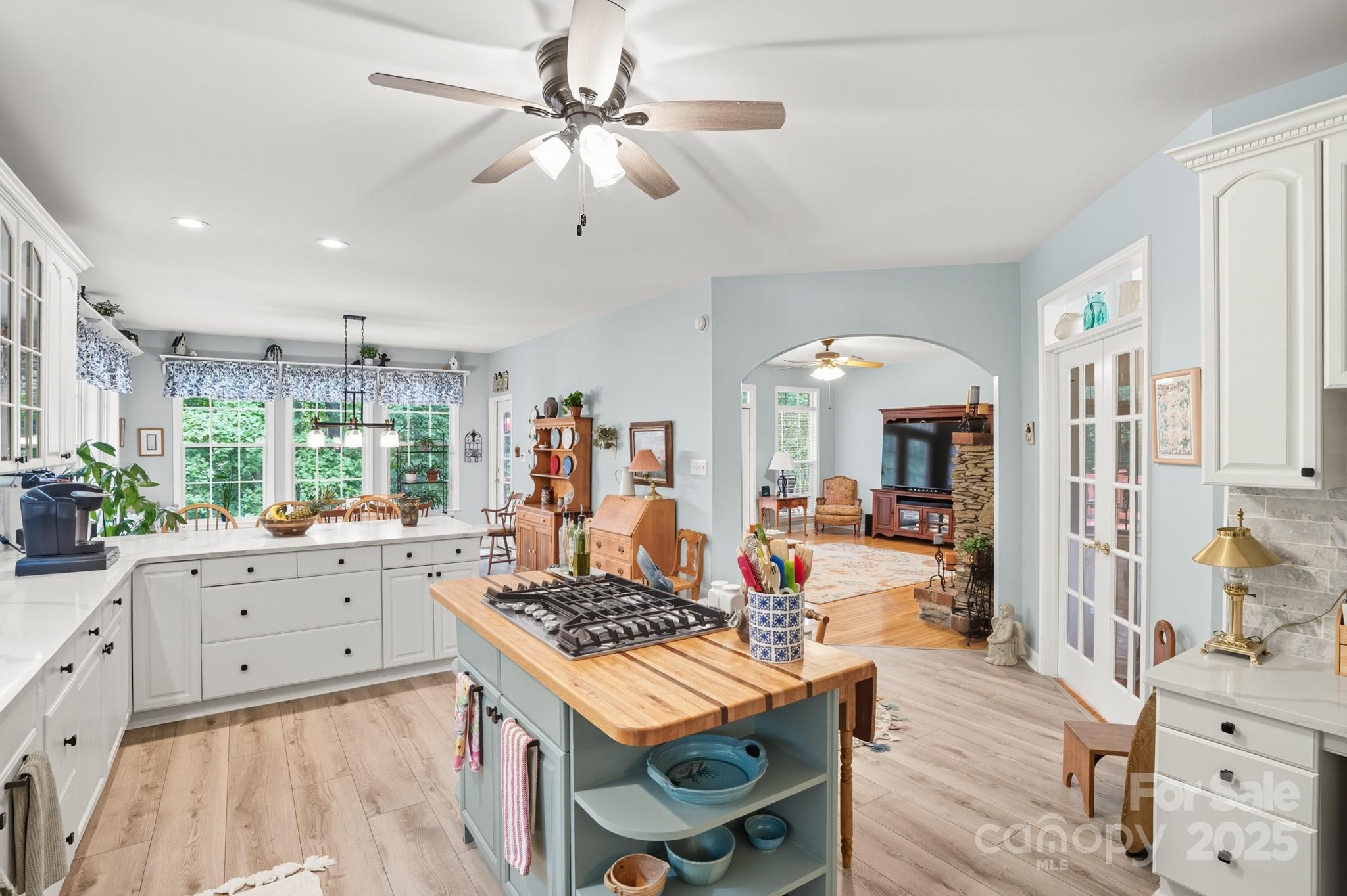 316 Brigadier Drive Clover, SC 29710 - Photo 13 of 47 a kitchen with a stove cabinets and wooden floor