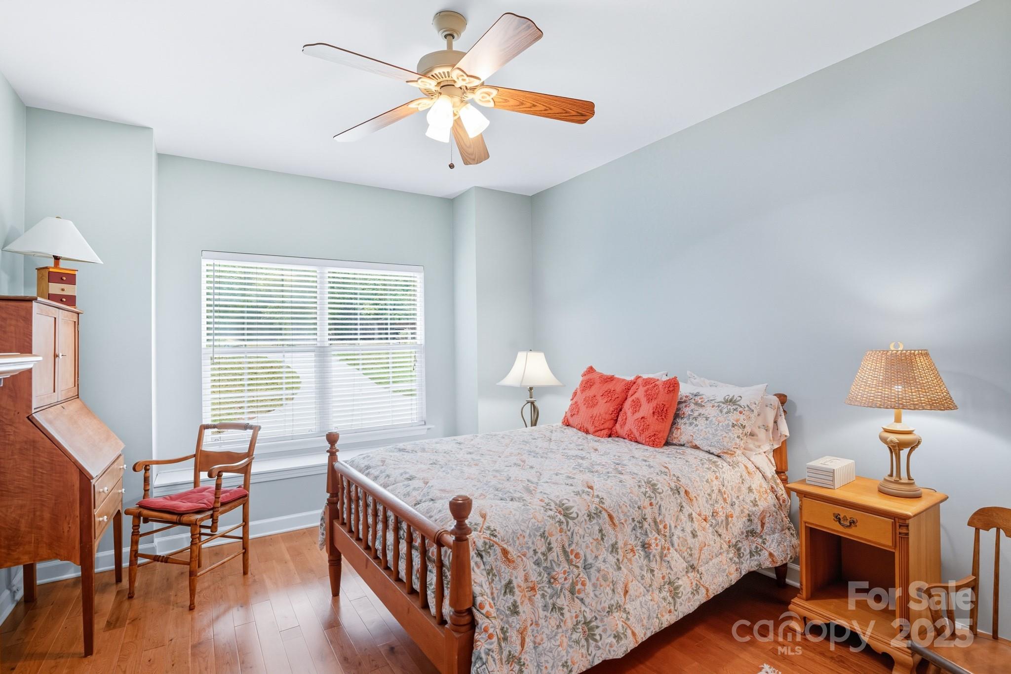 316 Brigadier Drive Clover, SC 29710 - Photo 26 of 47 a bedroom with a bed and a chandelier