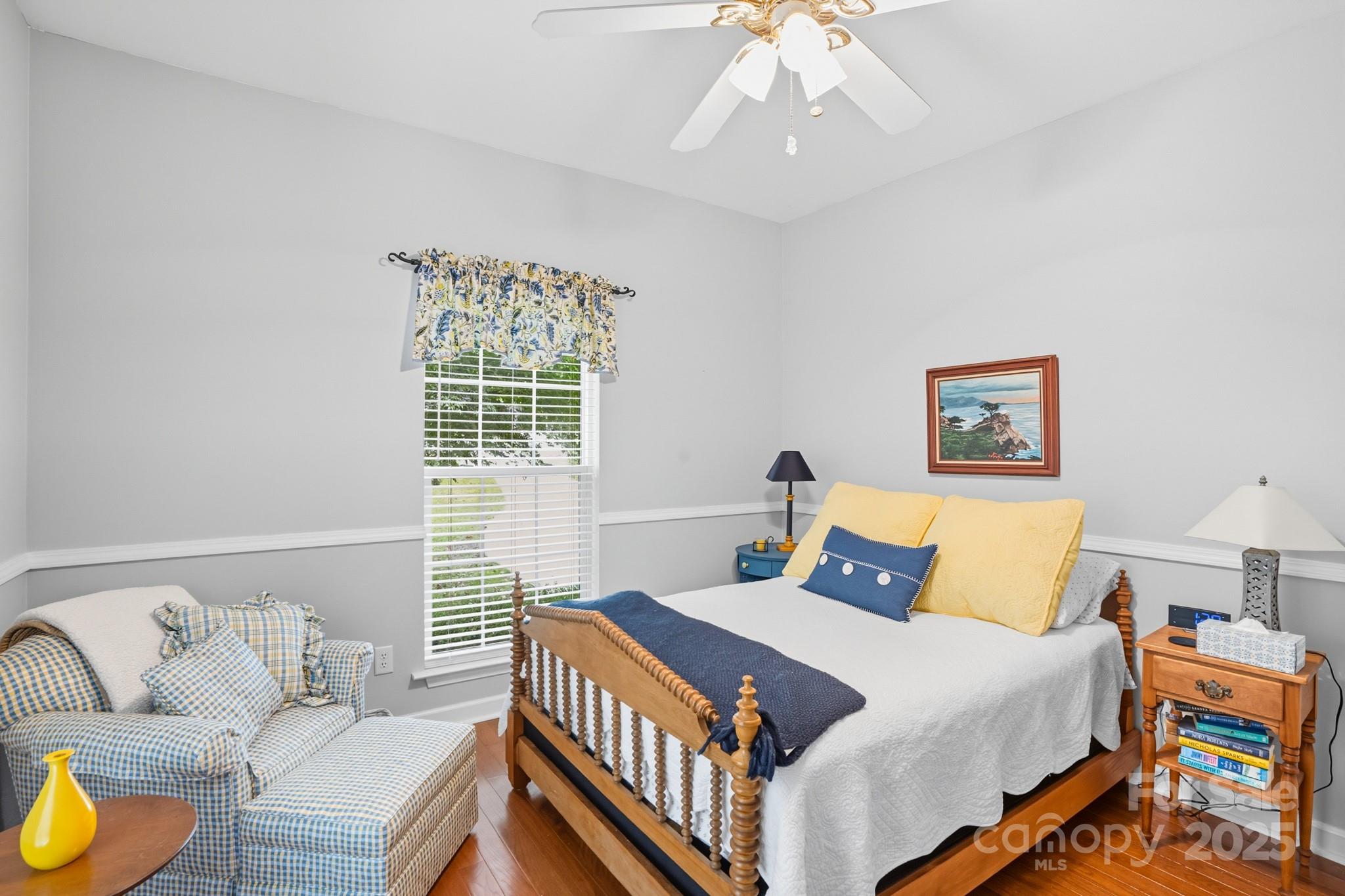 316 Brigadier Drive Clover, SC 29710 - Photo 27 of 47 a bedroom with a bed and wooden floor