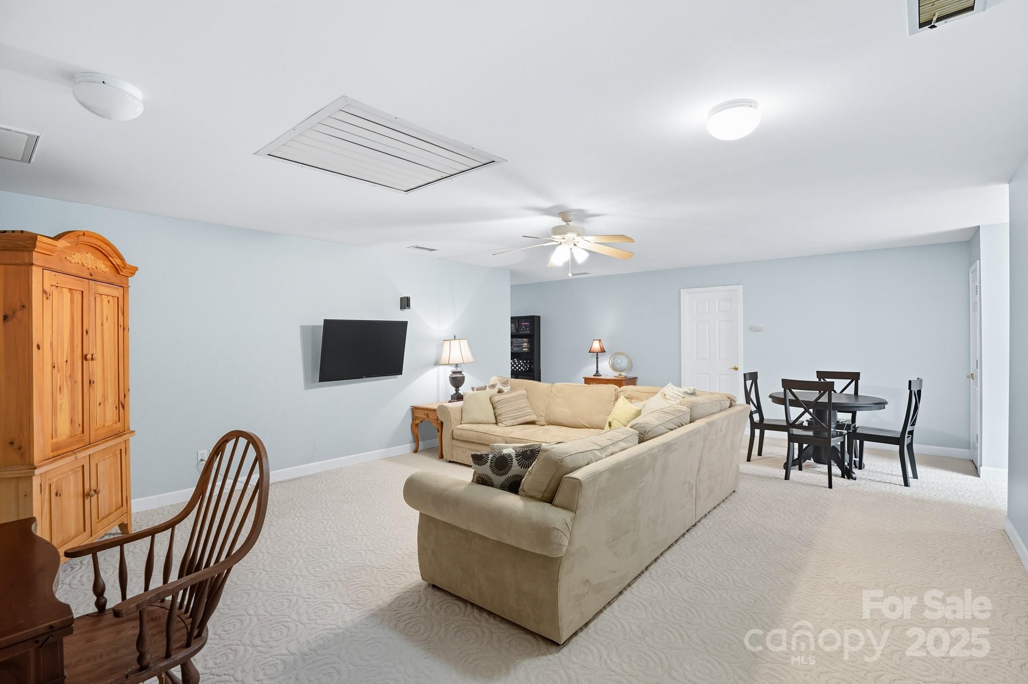316 Brigadier Drive Clover, SC 29710 - Photo 32 of 47 a living room with furniture and a flat screen tv