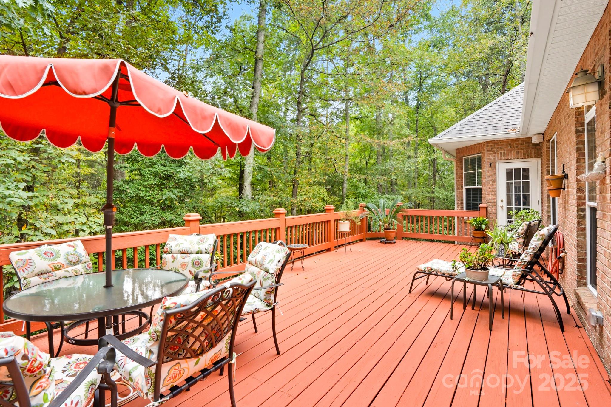 316 Brigadier Drive Clover, SC 29710 - Photo 38 of 47 a view of a chairs and table on the deck